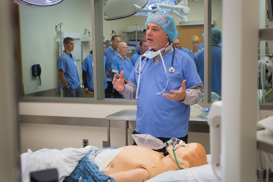 Matt Emery, Grand Rapids community assistant dean, presenting during simulation.